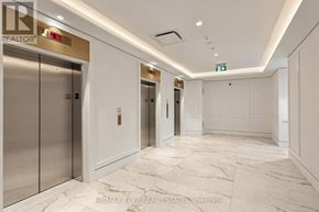 Toronto (Humber Heights) condo for rent - A room with a view of a construction site through large windows.