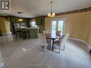 Caledon apartment for rent - A dining room with a table and chairs.