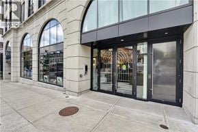 Hamilton apartment for rent - A building with a glass door entrance and a sign that says "REALTOR".