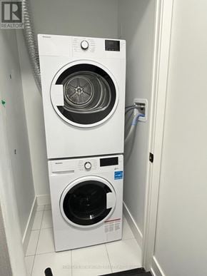 Toronto (Church-Yonge Corridor) condo for rent - A white washing machine and dryer in a small laundry room.