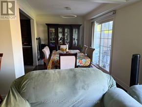 Whitby (Lynde Creek) apartment for rent - A dining room with a table set for four.