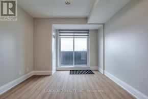 Oakville (Jm Joshua Meadows) condo for rent - A room with a window and a door leading to a balcony.