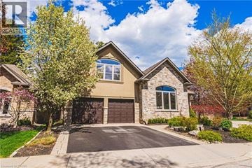 Burlington apartment for rent - A house with a driveway and a garage door.