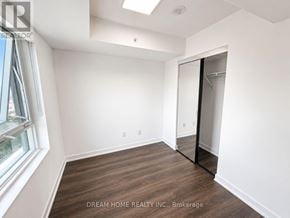 Toronto (North St. James Town) condo for rent - A room with a sliding door and a window.