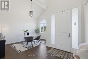 Thames Centre apartment for rent - A dining room with a table set for four.