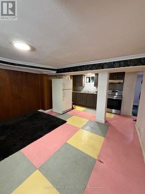 Toronto (Dorset Park) apartment for rent - A room with a checkered floor and a realtor logo on the wall.