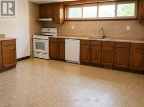 Vaughan (East Woodbridge) apartment for rent - A kitchen with wooden cabinets and a tile floor.