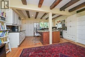 Caledon (Cheltenham) apartment for rent - A kitchen with a red rug on the floor.