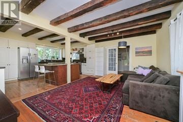Caledon (Cheltenham) apartment for rent - A living room with a rug and a couch.
