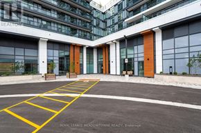 Markham (Greensborough) condo for rent - A parking lot in front of a building with the words "Royal LePage Meadowtowne Realty, Brokerage" written on it.