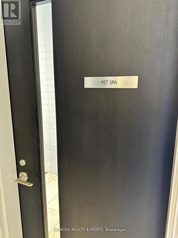 Hamilton (Beasley) condo for rent - A door with a sign that says "Pet Spa".