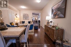Milton (Fo Ford) townhouse for rent - A dining room with a table and chairs.
