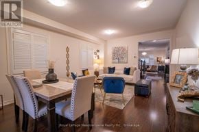 Milton (Fo Ford) townhouse for rent - A dining room with a table and chairs.