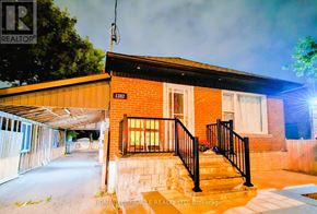 Toronto (Wexford-Maryvale) apartment for rent - A house with a realtor sign in front of it.