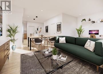London South (South U) townhouse for rent - A living room with a green couch and a coffee table.