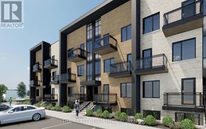 London South (South U) townhouse for rent - A modern apartment building with balconies and a car parked in front.