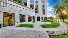Toronto (Banbury-Don Mills) condo for rent - A modern building with a stone walkway in front.