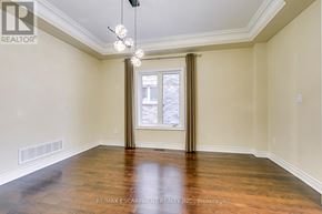 Oakville (Jc Joshua Creek) apartment for rent - A room with wooden floors and a window with curtains.