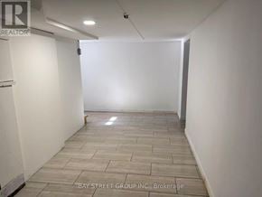 Markham (Unionville) apartment for rent - A room with a tiled floor and white walls.