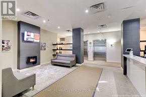 Toronto (Cabbagetown-South St. James Town) condo for rent - A realtor's office with a fireplace and a couch.