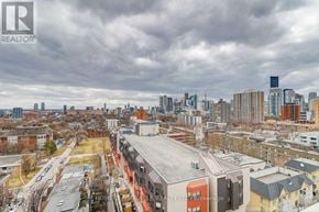 Toronto (Cabbagetown-South St. James Town) condo for rent - A cityscape with a cloudy sky and buildings of various heights.