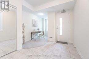 Pickering townhouse for rent - A white room with a table and chairs.