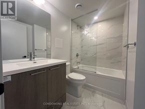 Vaughan (Concord) condo for rent - A bathroom with a sink, toilet and bathtub.