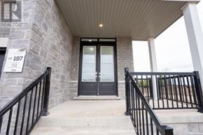Adjala-Tosorontio (Colgan) apartment for rent - The front door of a house with a sign that says "Lot 197".
