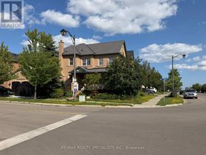 Milton (Sc Scott) apartment for rent - A house with a sign that says RE/MAX REALTY SPECIALISTS INC. Brokerage.