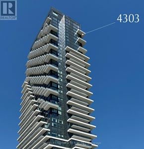 Toronto (Banbury-Don Mills) condo for rent - A tall building with the number 4303 on it.