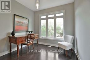 Oakville (Wt West Oak Trails) apartment for rent - A room with a desk, chair, and a painting on the wall.