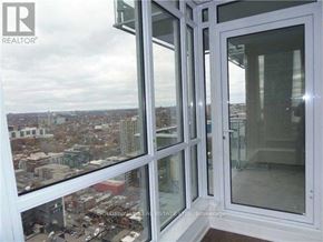 Toronto (Waterfront Communities) condo for rent - A view from a window looking out at a cityscape.