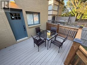 Toronto (Yonge-Eglinton) apartment for rent - A patio with a table and chairs is shown.