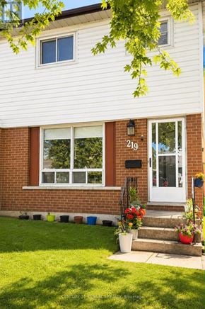 Oshawa (Vanier) apartment for rent - A house numbered 21g with a white door and windows.