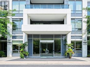 Markham (Grandview) condo for rent - A modern building with the number 7165 on it.
