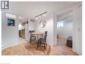 Waterloo apartment for rent - A dining area with a table and chairs is shown in the image.