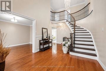 Markham (Milliken Mills East) apartment for rent - A large, open living room with a staircase leading to the upper floor.