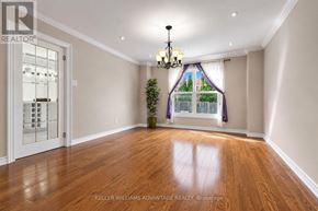 Markham (Milliken Mills East) apartment for rent - A room with a chandelier and a potted plant.