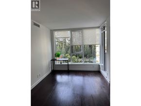 Vancouver apartment for rent - A room with a window and a wooden floor.