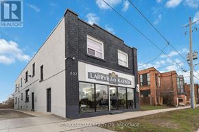 St. Catharines (E. Chester) apartment for rent - A building with the sign "Larryb & Barber" on the front.