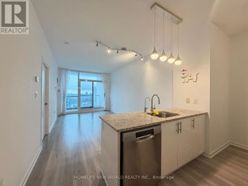 Toronto (Henry Farm) condo for rent - A kitchen with a granite countertop and stainless steel appliances.