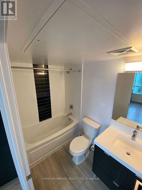 Toronto (Church-Yonge Corridor) condo for rent - A bathroom with a toilet, sink, and bathtub.