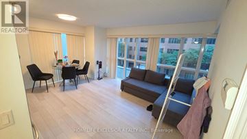 Toronto (Church-Yonge Corridor) condo for rent - A living room with a dining table and chairs.