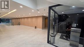 Toronto (Church-Yonge Corridor) condo for rent - A realtor's office with a person standing by the door.