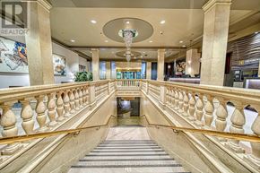 Toronto (Bay Street Corridor) condo for rent - A large atrium with a water feature in the middle.
