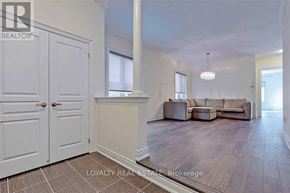 Richmond Hill (Oak Ridges) apartment for rent - A living room with a couch, chairs, and a table.