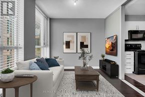 Toronto (West Humber-Clairville) condo for rent - A modern living room with a white sofa, a coffee table, and a TV.