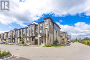 Whitby (Brooklin) townhouse for rent - A row of modern townhouses with the logo of Tanya Tierney Team Realty Inc. in the bottom left corner.