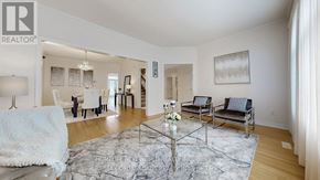 Markham (Cachet) apartment for rent - A living room with a glass coffee table and a white sofa.