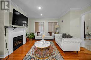 Newmarket (Woodland Hill) apartment for rent - A living room with a fireplace and a white couch.